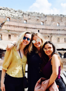 3 girls in front of the Colosseum in Rome